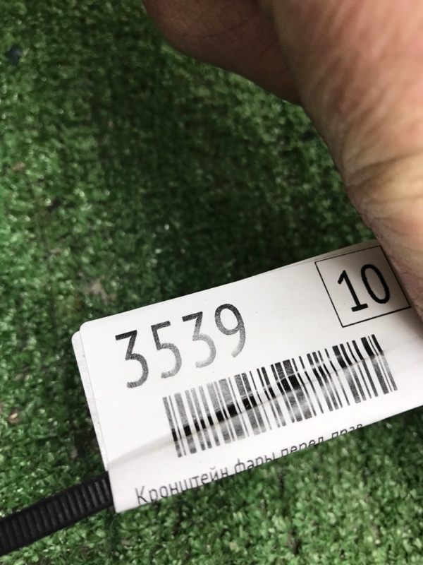 Кронштейн фары Honda Civic FD1 R18A 2005 перед. прав. (б/у) Кронштейн фары Honda Civic FD1 R18A 2005 перед. прав. (б/у)