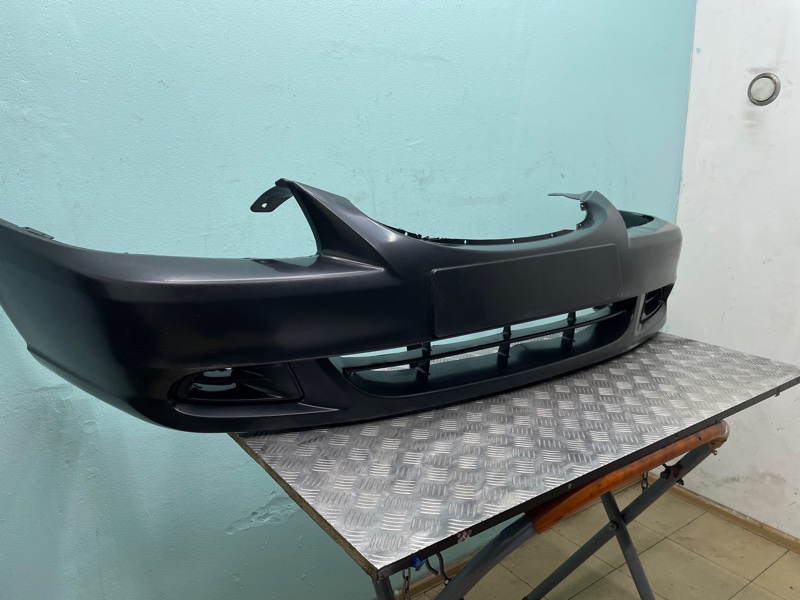 Бампер Hyundai Accent + Тагаз новая