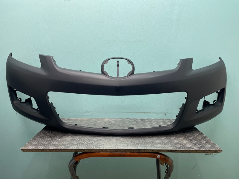Бампер Mazda CX-7 06-10г новая