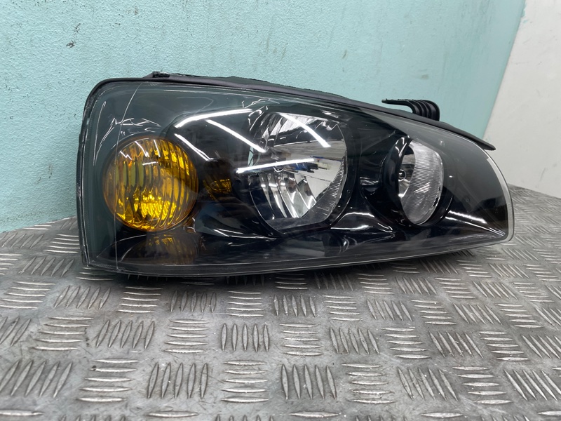 Фара правая Elantra 03-09г XD