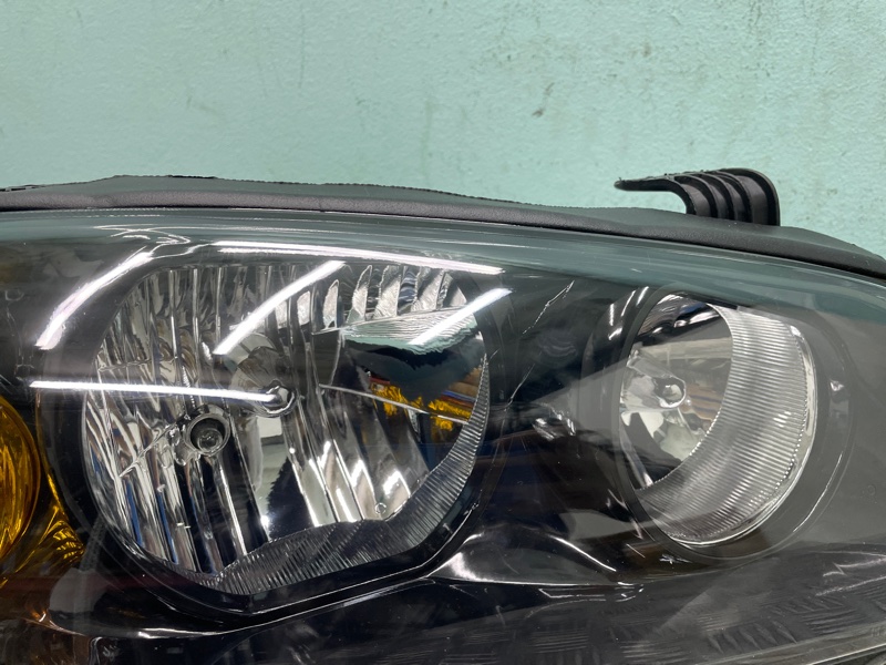 Фара правая Elantra 03-09г XD
