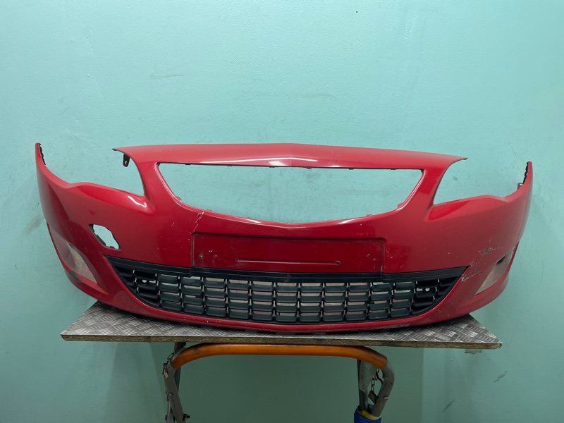 Бампер Opel Astra дефект 09-12г БУ