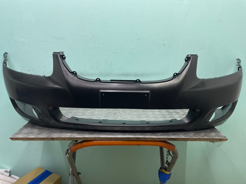 Бампер Kia Cerato 06-08г новая