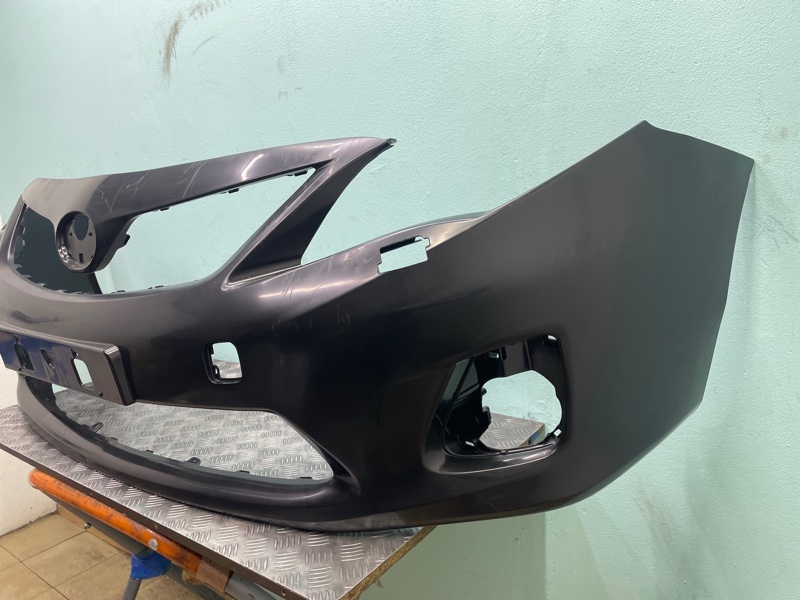Бампер Toyota Corolla 150 РЕСТ
